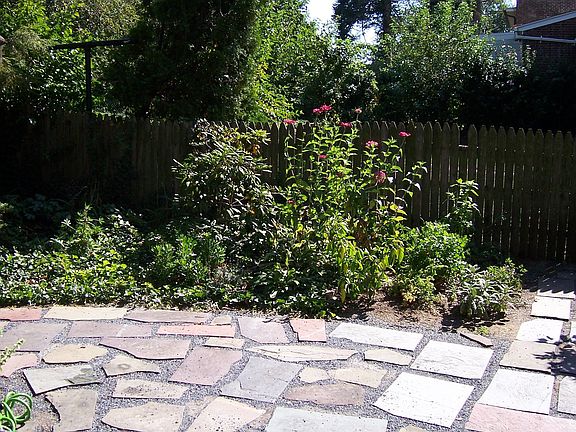 Stone patio and herb garden