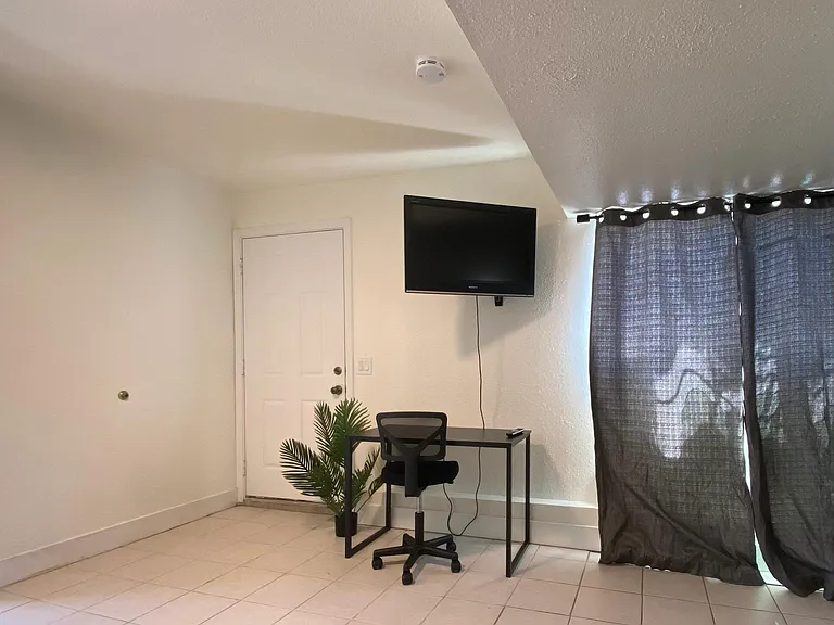 Studio: Workspace, Wall mounted TV with ROKU