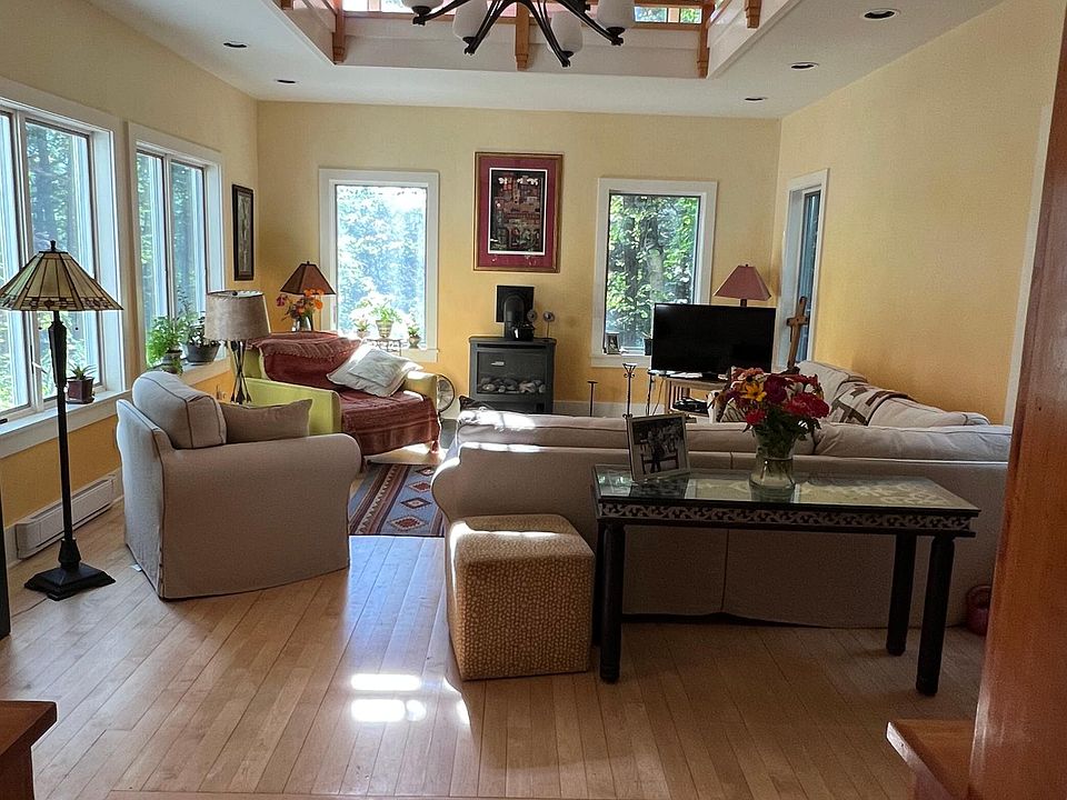looking into the living room from the kitchen - note upstairs full circular balcony
