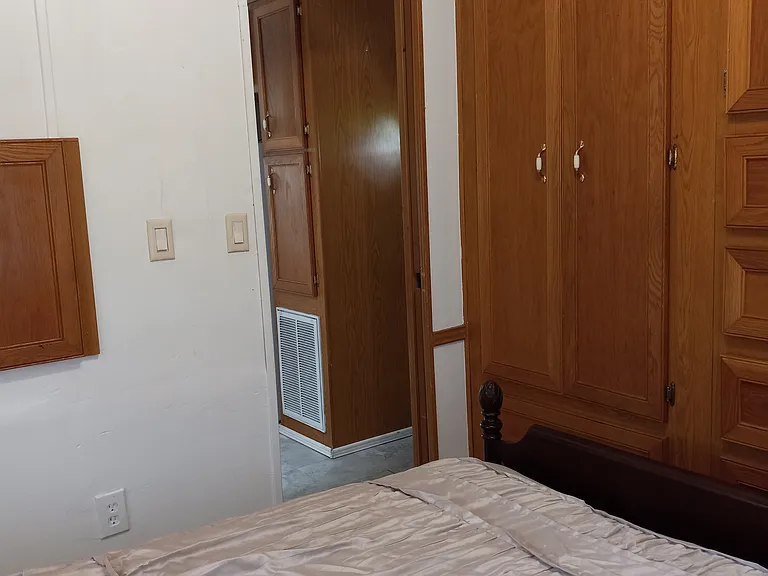 Oak cabinets in bedroom