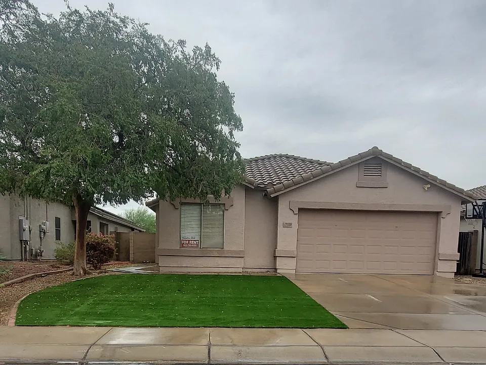 9323 W Harmony Ln