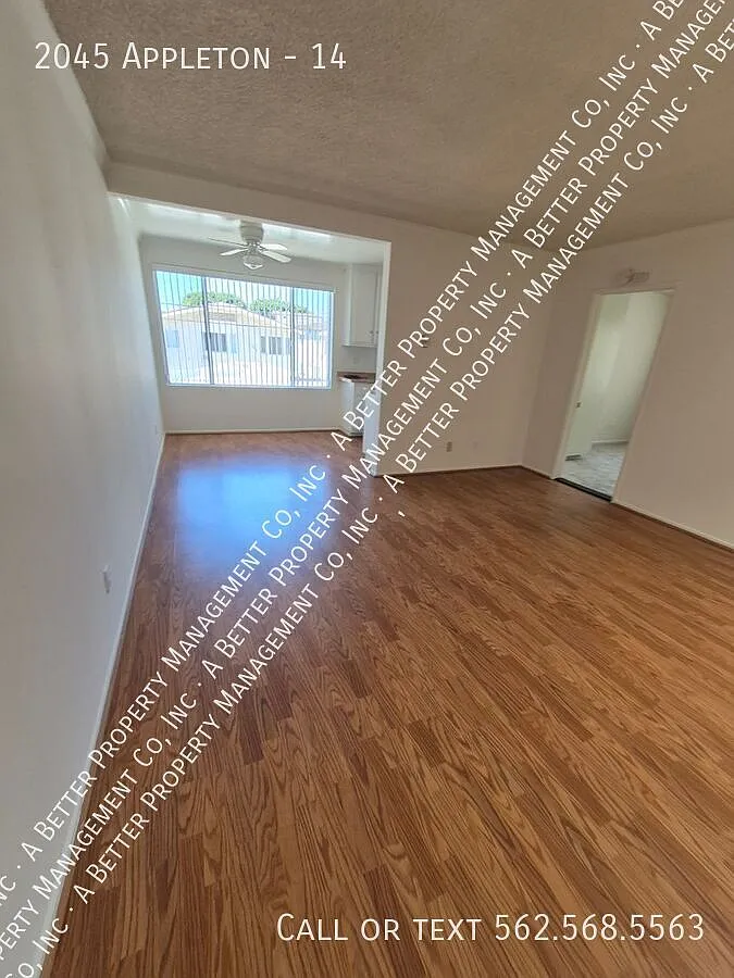 Bright Upper 1 Bed w/Modern Hardwood Laminate Floors, Dishwasher & Onsite Laundry in Gated Property! — Photo 1