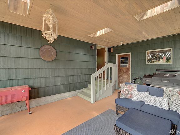 Spacious covered area perfect for entertaining year round. 