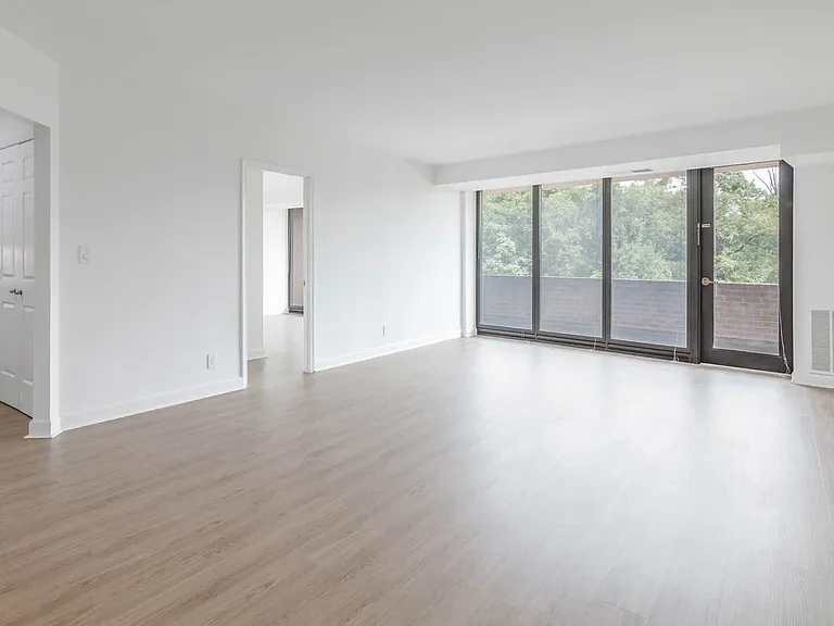 Living Room with Balcony and Hard Surface Flooring