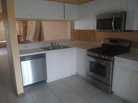 Kitchen leading to bar area