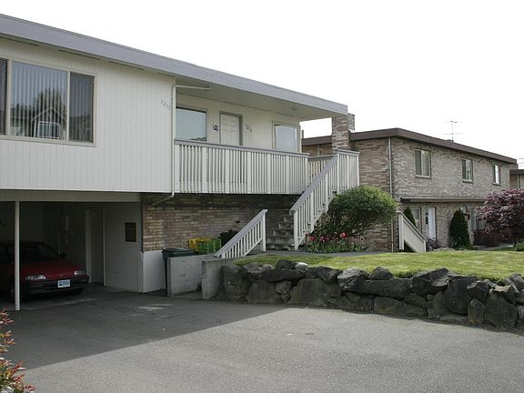 Carport parking space to the right as well as additional parking space behind it.