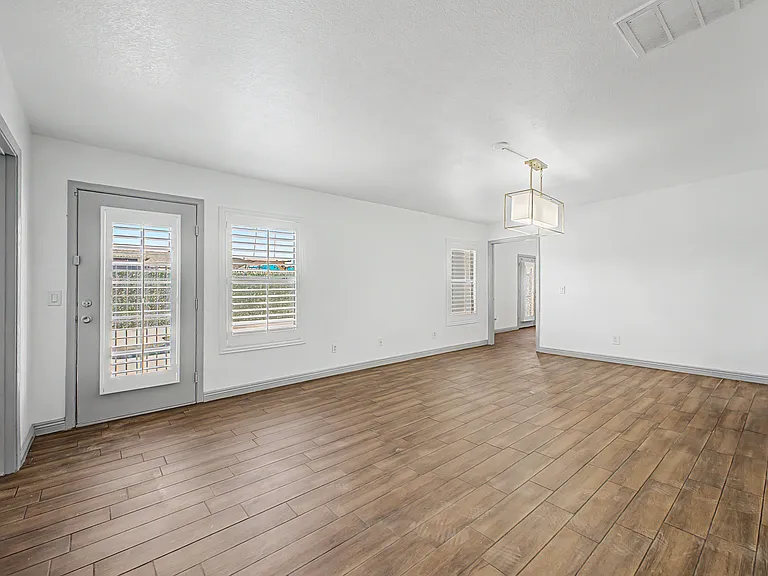 Dining/Living Room to back exit to pool