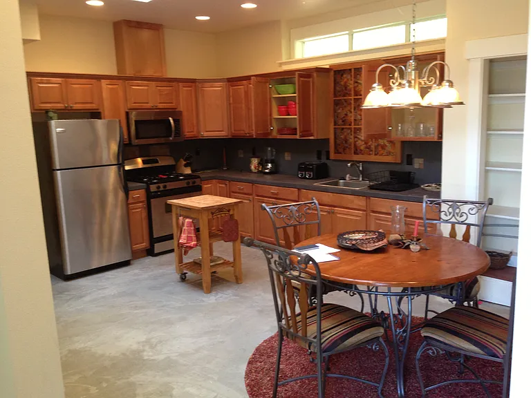 Large kitchen with lots of pantry space, heated floors and skylight