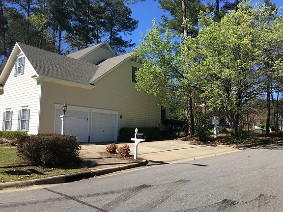 Two car garage + 3- Car pads