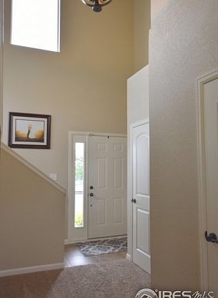 Open entry with vaulted ceiling