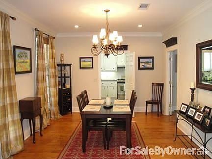 Dining Room : Spacious dining room with hardwood floors.