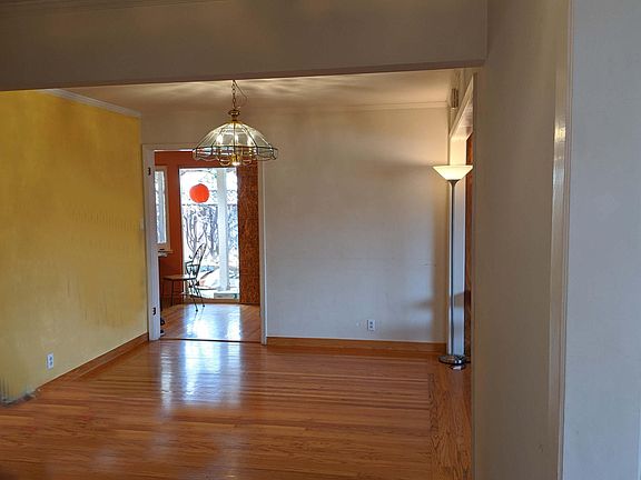 Tile entry way and dining area, actually painted white now and a new figure has been provided.