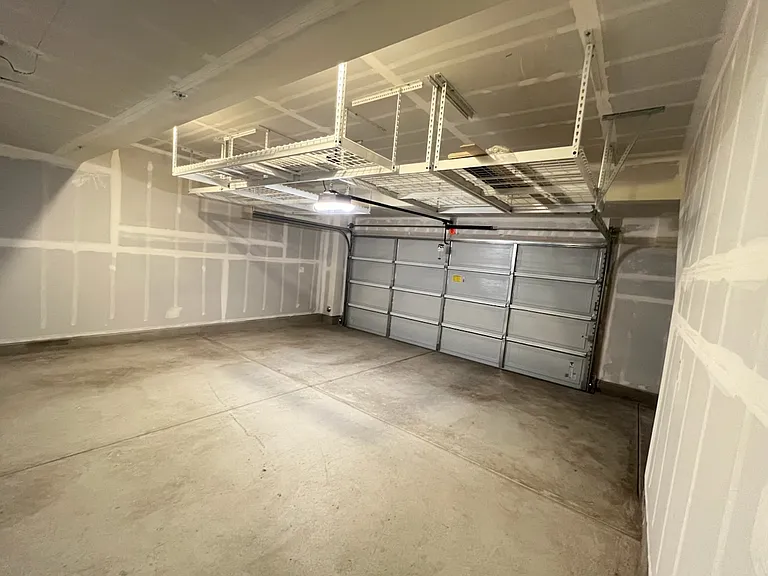 2 car garage with storage shelves