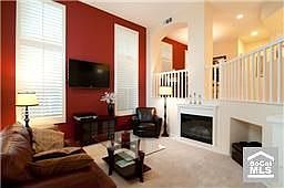 Gorgeous Living Area with Fireplace, Media Nook, and an Open Floor-plan