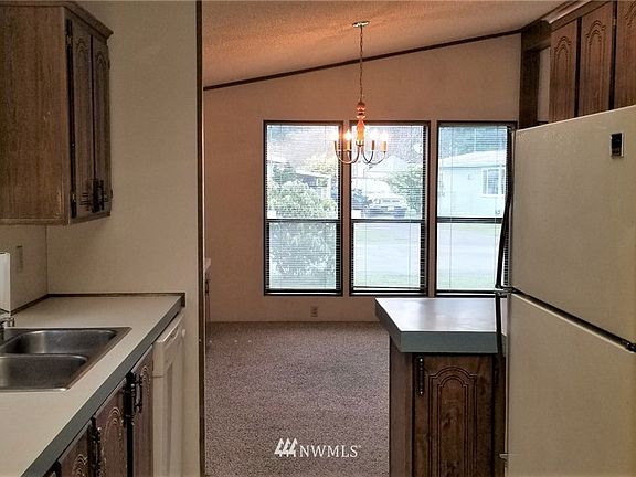 From the laundry room and back door into the kitchen.