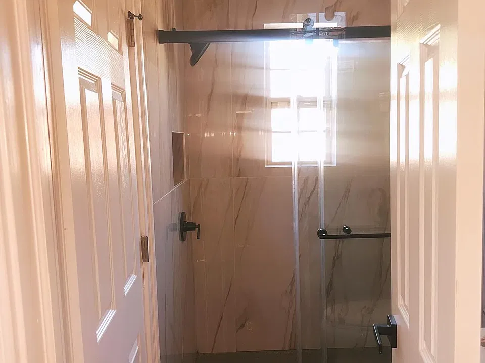 The full bathroom. The 1/2 bath has toilet/sink same exterior.