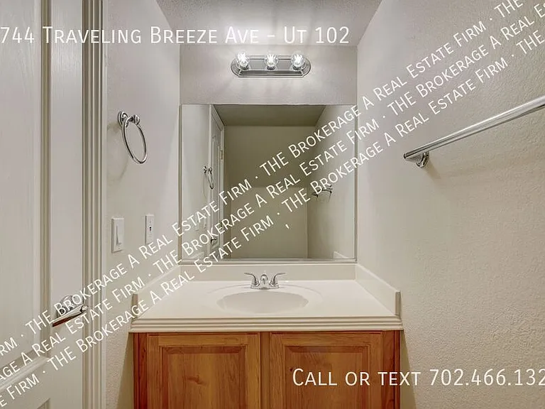 8744 Traveling Breeze Ave #102 — Photo 28