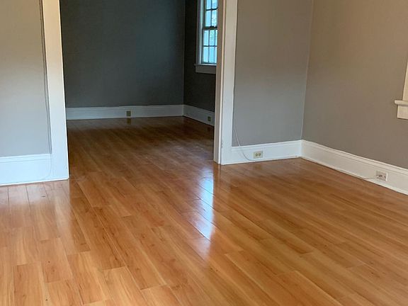 View from the front door (looking at living room moving into bedroom)