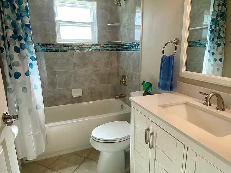 Beautiful tile and spacious guest bath