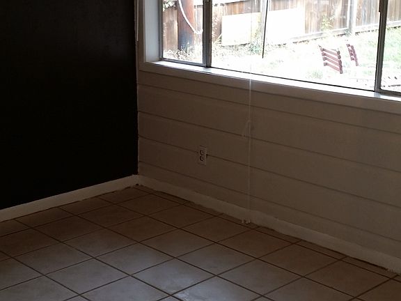 Back bedroom opens into backyard