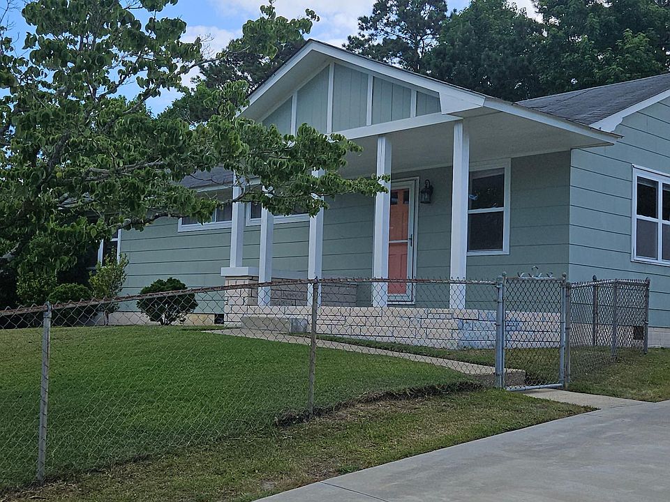 Paved Driveway with fully fenced yard.
