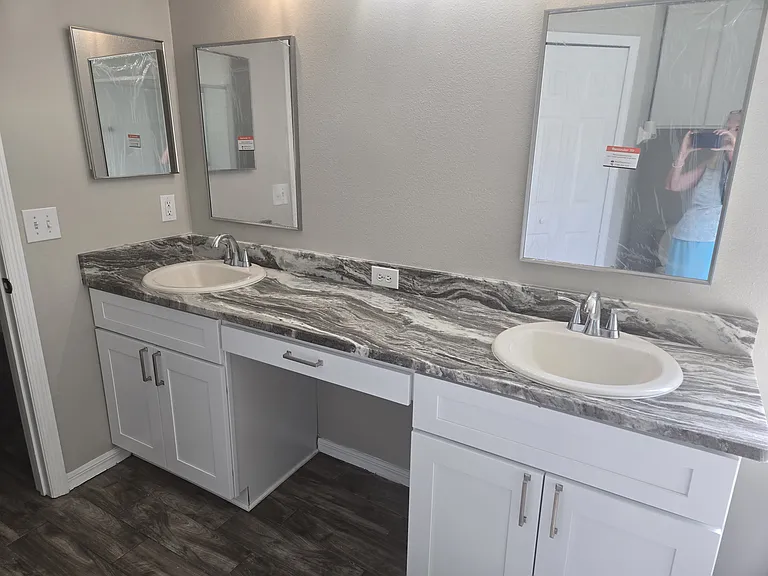 Master Bath with dual sinks and new soft pull cabinets