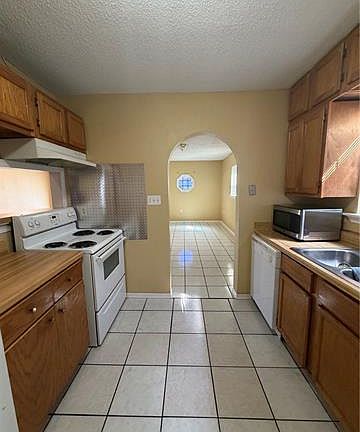 4th image of 9411 Dinkins St