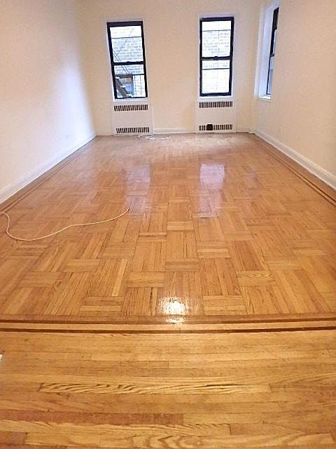 1st image of 8836 Elmhurst Ave #1/K