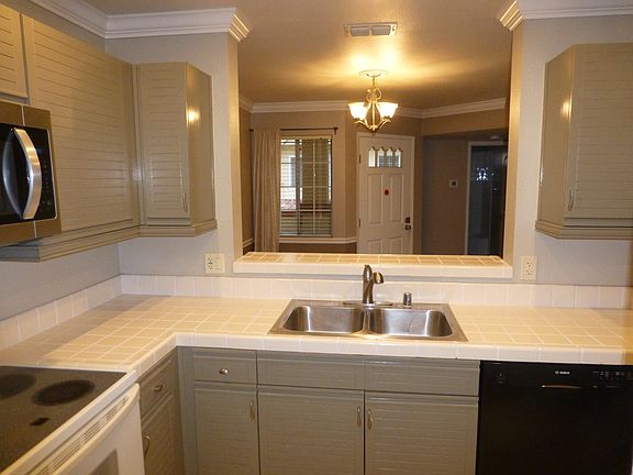 Kitchen looking toward entry door