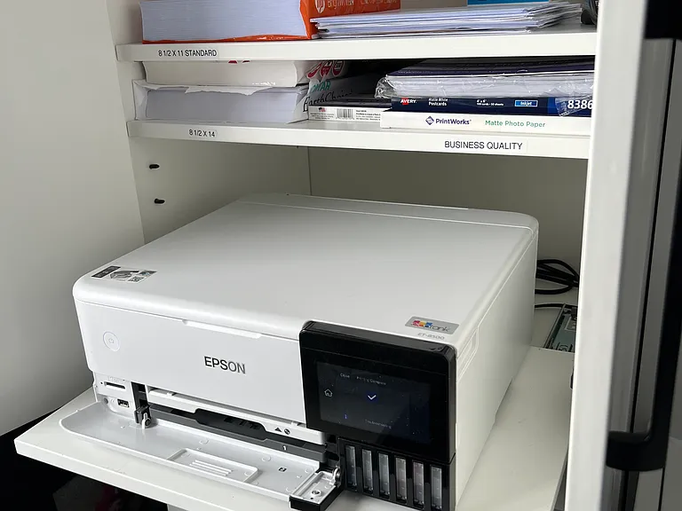 printer-scanner-copier slides out of wall cabinet