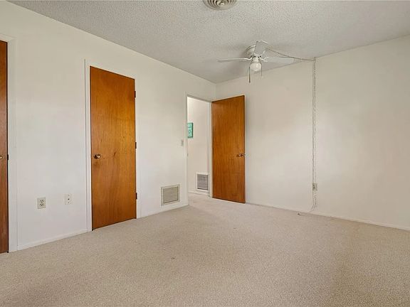 Bedroom with two closets.