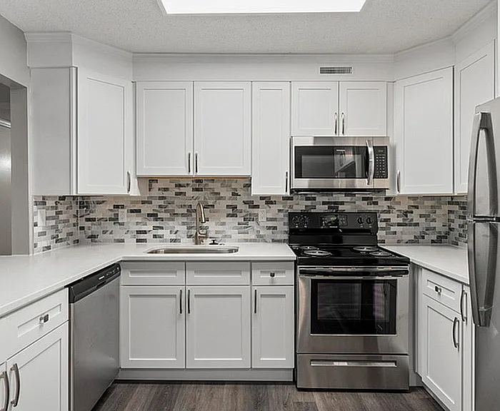 Step into sophistication with this sleek kitchen, perfect for culinary adventures.