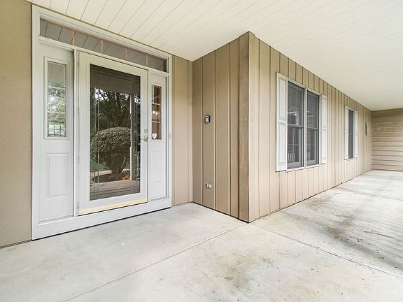 Wide Front Porch has room for some patio furniture and some flowerings pots for you to sit and enjoy