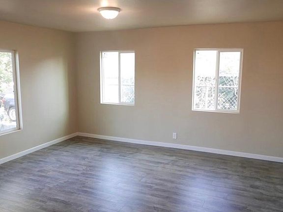 Living room. House is currently tenant occupied.