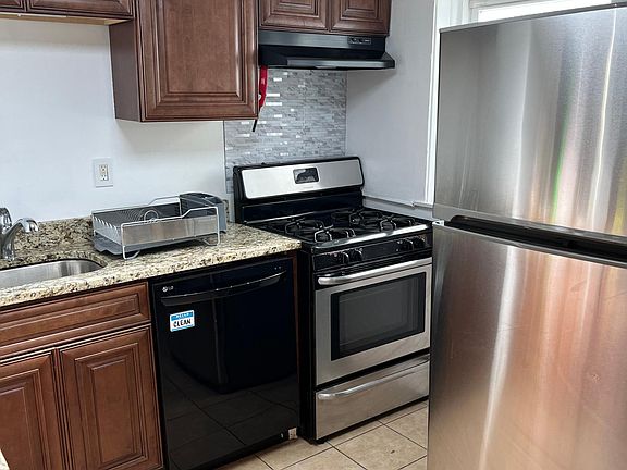 Kitchen - Fridge, stove and dishwasher