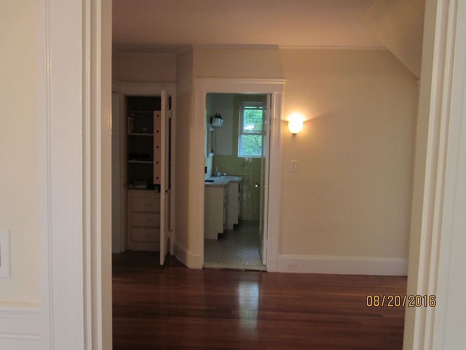 view from dining room of bathroom, linen closet, foyer.