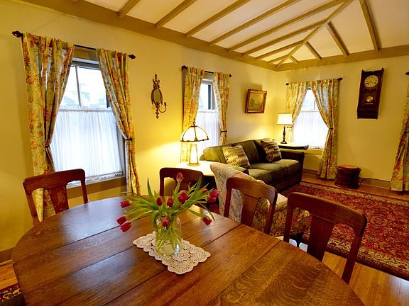 Open with plenty of windows is a dining area and living room