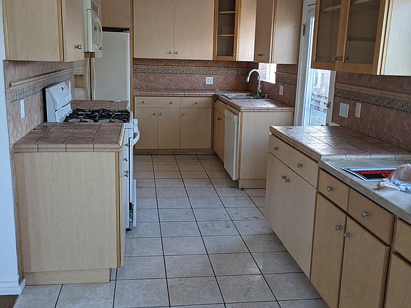 Huge kitchen with tons of storage space.