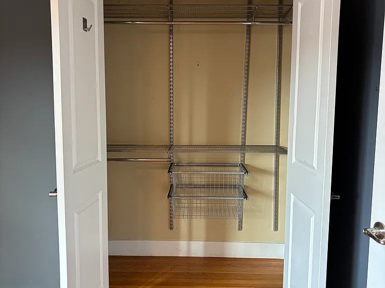 Closet #3: Large bedroom closet with customizable Elfa storage system.