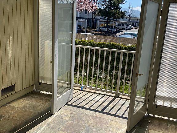Private screened patio off living room
