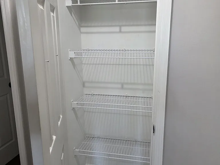 Closet across from kitchen (was used for kitchen appliances)