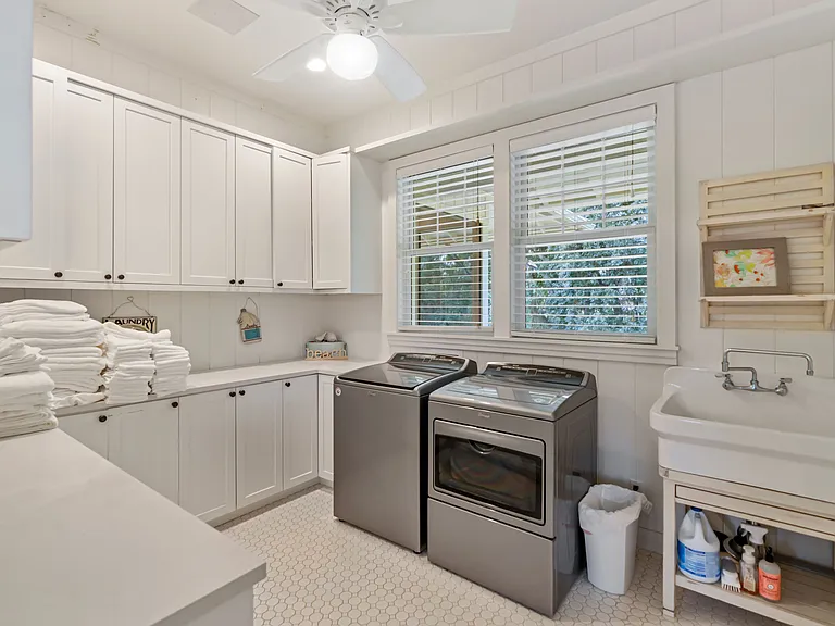 Large Laundry Room with optional office, craft, or mud room to the right. Has outdoor access.