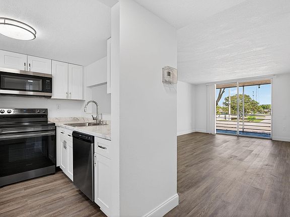 4th image of 9081 Lime Bay Boulevard #209