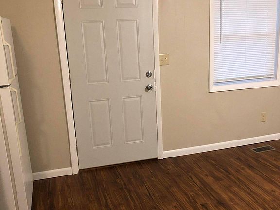 Entry way into living room / kitchen combo.