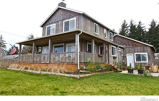 The classic coastal home with wrap around porch.  Exterior entry to guest bedroom on right side of deck.