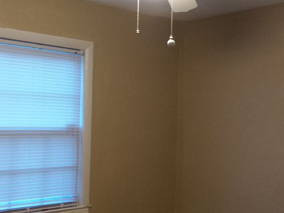 one of three bedrooms