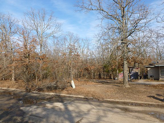 South end of lot; neighbor