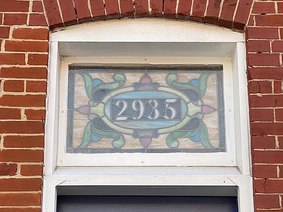 Original stained-glass address window.