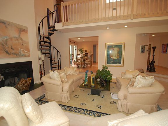 Living Room - Hardwood floor, fireplace, stairs to loft
