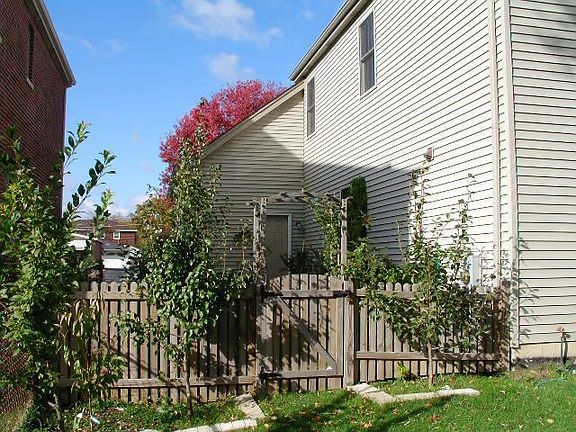 side yard with arbor
